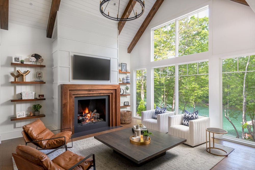 Living room with fireplace and views