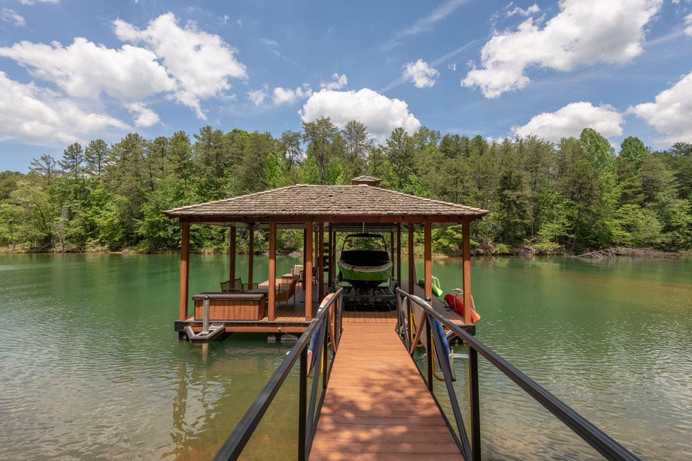 Covered dock with boat lift on Lake Keowee