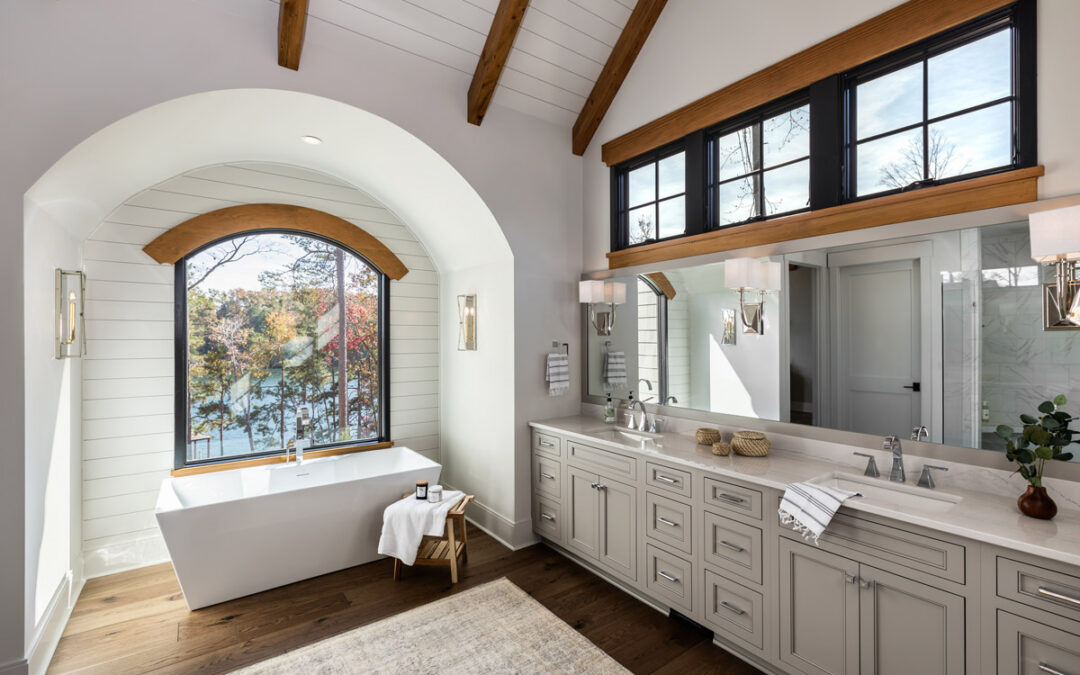 Bathroom with soaking tub and views of Lake Keowee