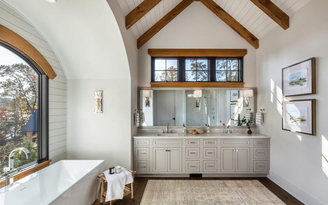 Bathroom with soaking tub and views of Lake Keowee