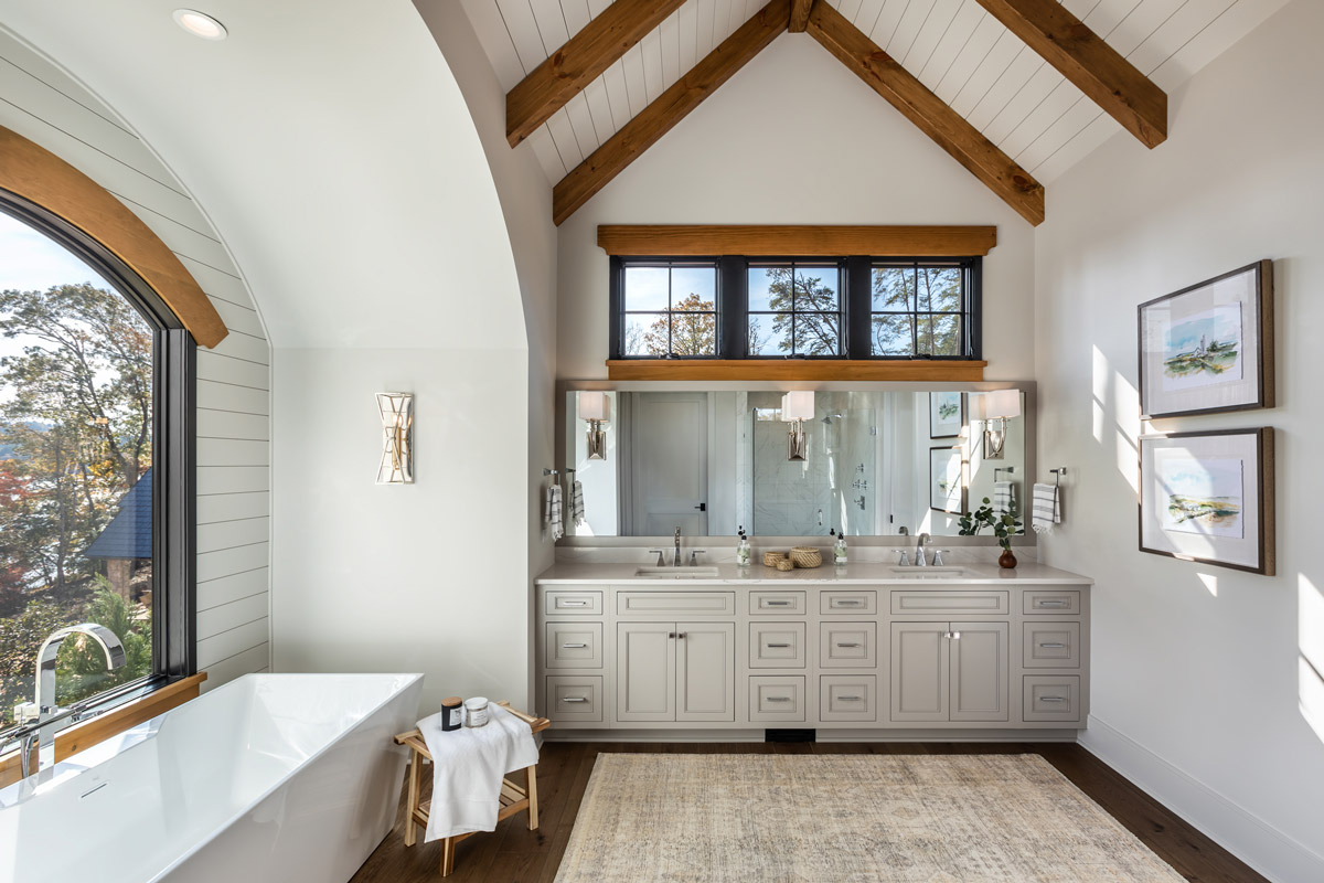 Bathroom with soaking tub and views of Lake Keowee