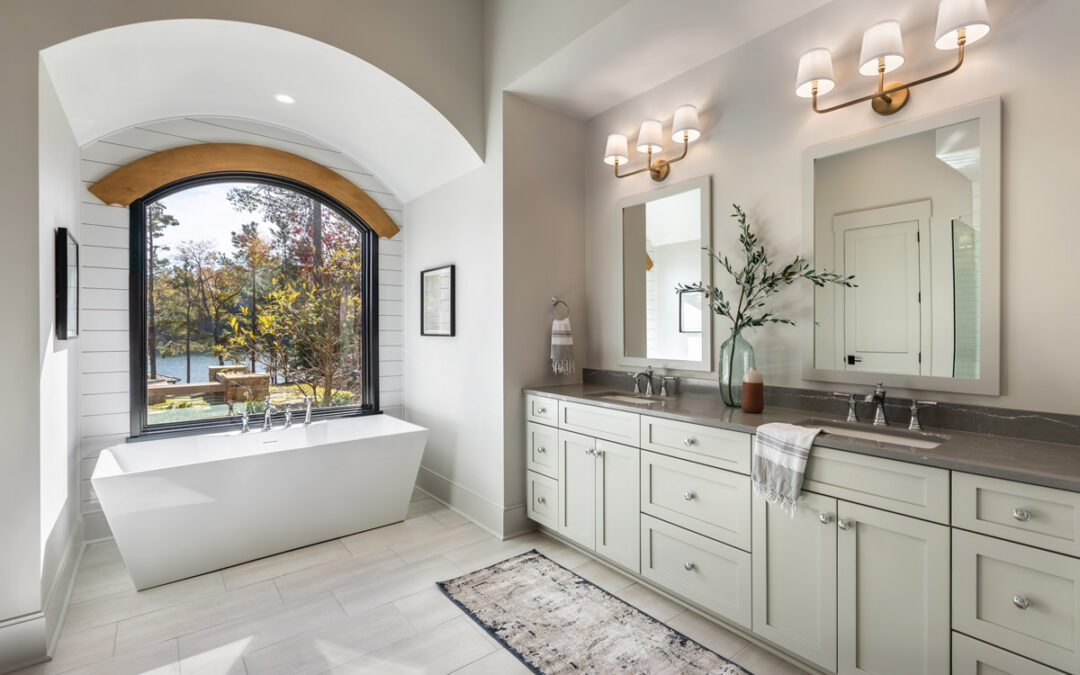 Bathroom with soaking tub and views of Lake Keowee
