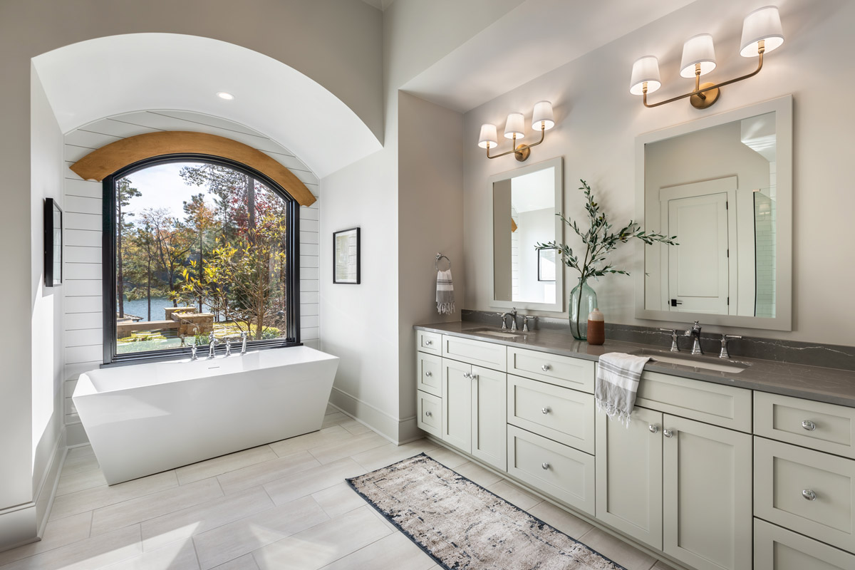 Bathroom with soaking tub and views of Lake Keowee