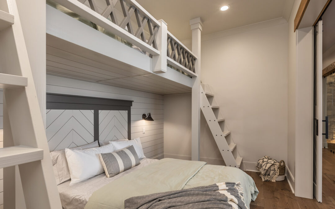 Bunkbeds in bedroom with sliding barn doors