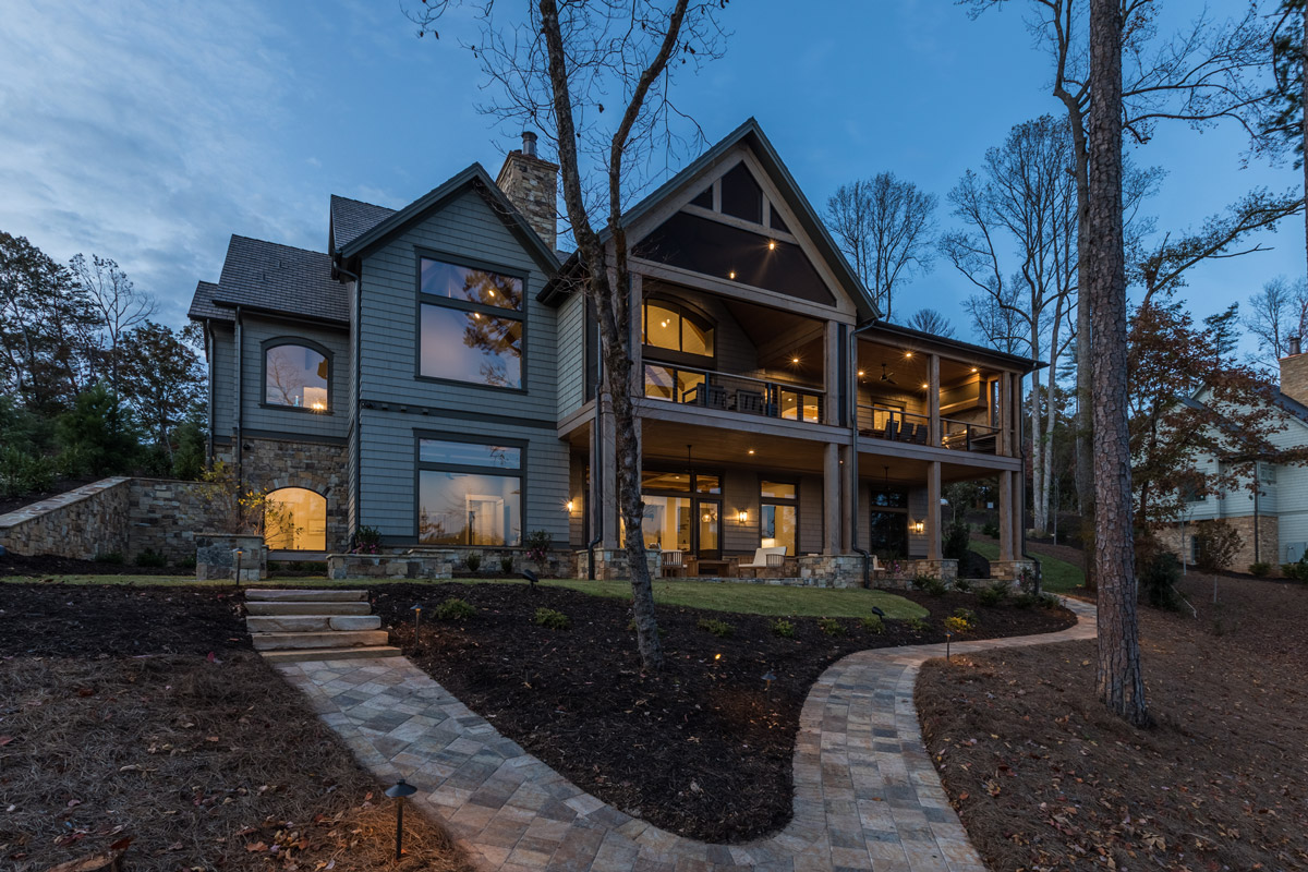 Rear of home with double porches facing Lake Keowee