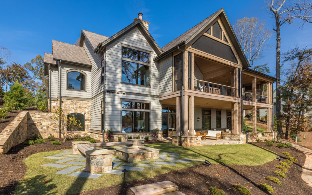 Rear of home with double porches facing Lake Keowee