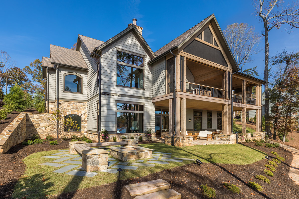 Rear of home with double porches facing Lake Keowee