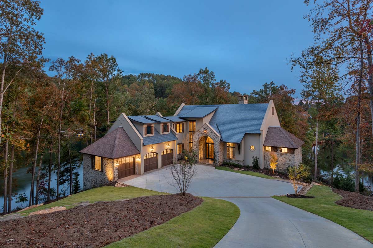 The home as seen from the street at dusk