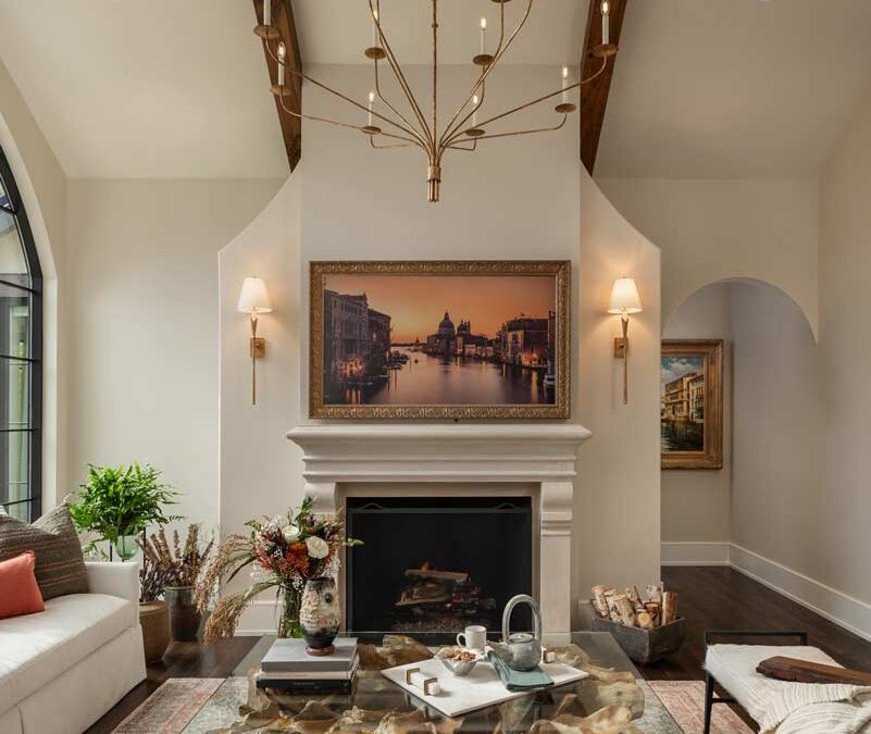 Elegant iving room with vaulted ceiling and fireplace