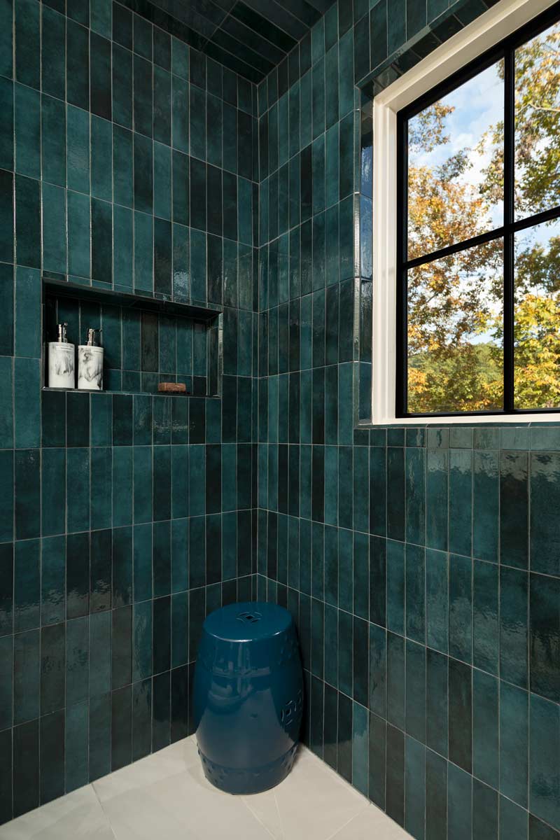 custom shower with blue tile