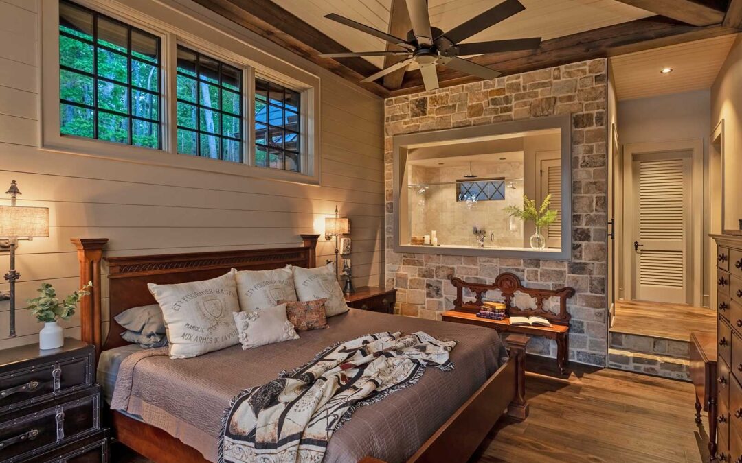 A master bedroom, beadboard walls, stone walls