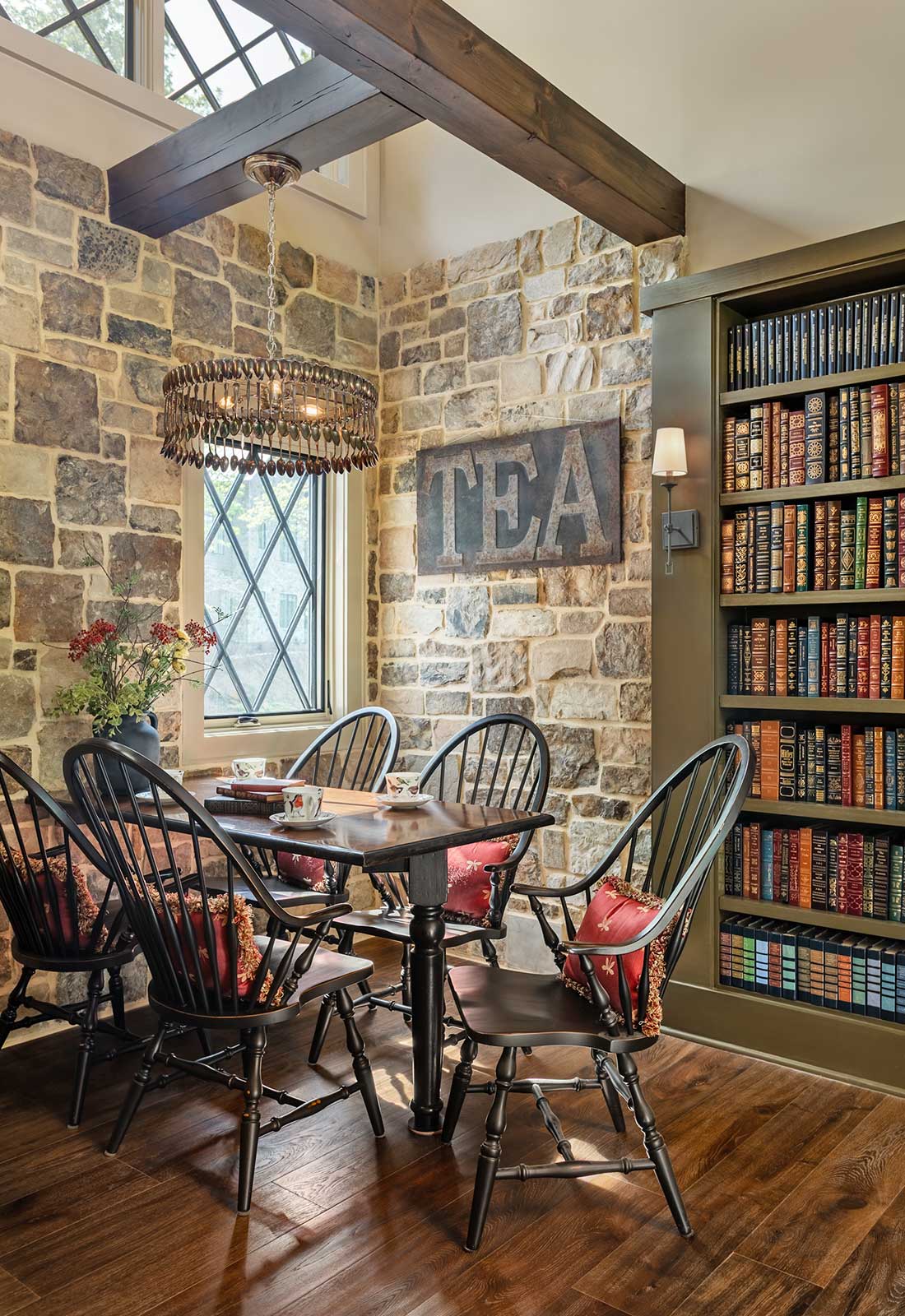 Stone walls, dining nook, bookshelves, antiques