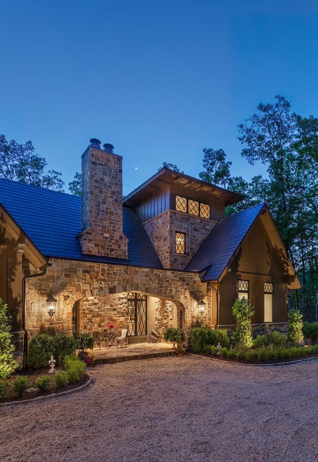 Exterior, stone fascia. Arched entry.
