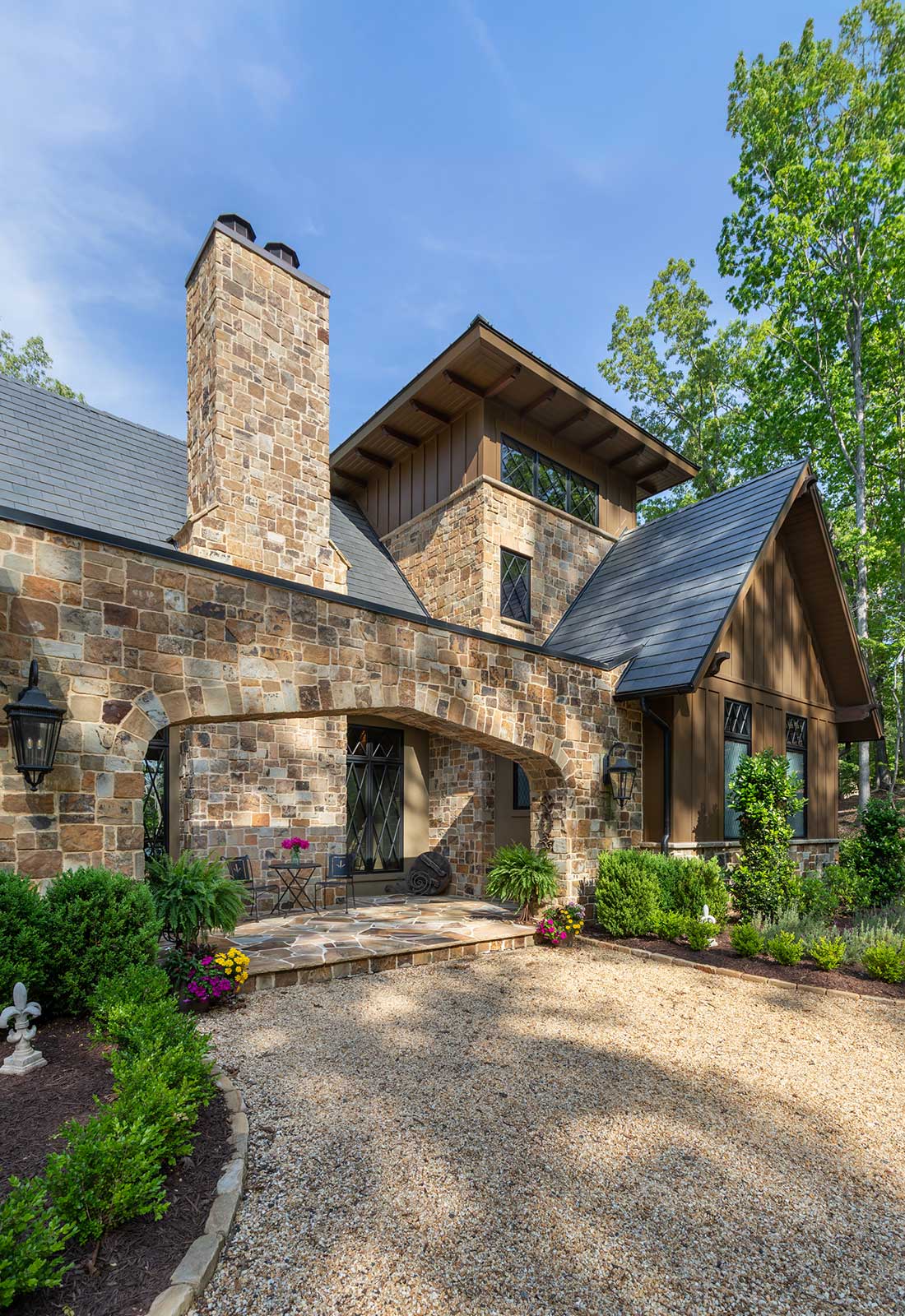 Exterior, stone fascia. Arched entry.