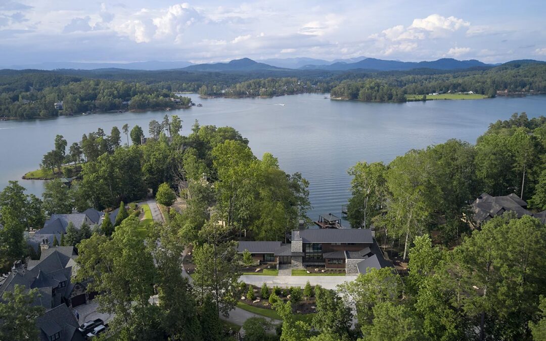 Aerial photo showing the front of the home, with Lake Keowee and the Blue Ridge Mountains in the distance