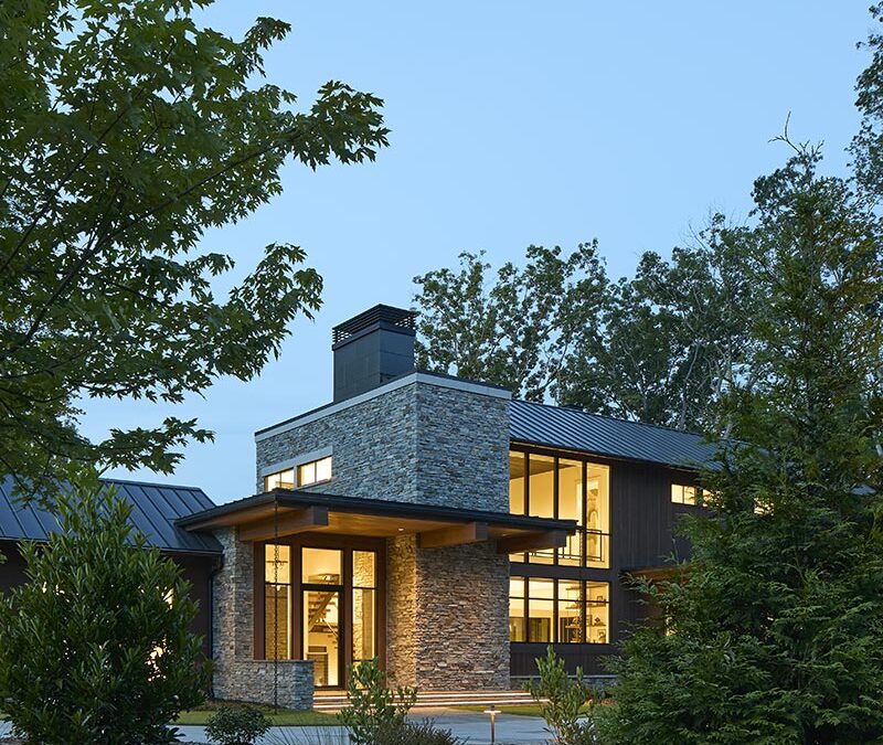 The entry portico as seen at dusk